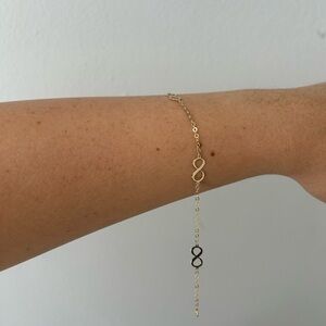 Elegant Gold and Black Bracelet